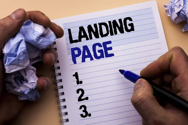 Handwriting text Landing Page. Concept meaning Website accessed by clicking a link on another web page written by Man on Notebook Book Holding Marker on the plain background. — Stock Photo, Image