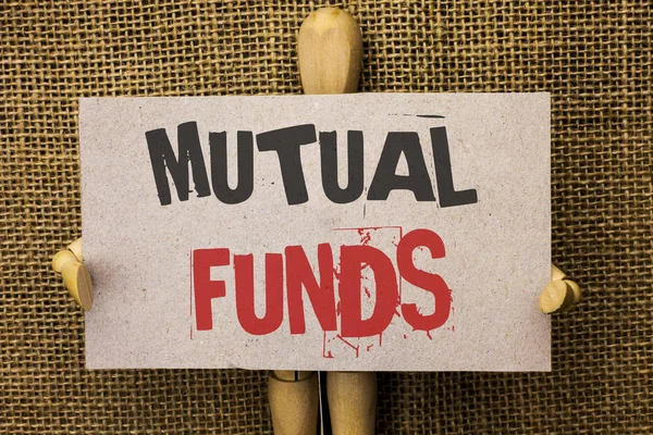 Conceptual hand writing showing Mutual Funds. Business photo tex