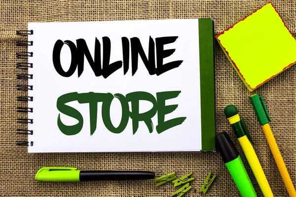 Text sign showing Online Store. Conceptual photo Internet related business Website where you can buy in the net written on Notebook Book on the jute background Pens Clips Sticky Note next to it. — Stock Photo, Image