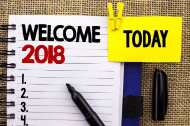 Word metin yazma hoş geldiniz 2018. İş kavramı kutlama yeni kutlamak gelecek tatminkar defter kitap jüt arka plan üzerinde bugün Clip Marker ile yanında yazılı dilek için.