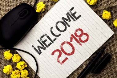 Word metin yazma hoş geldiniz 2018. İş kavramı kutlama yeni kutlamak gelecek tatminkar defter kağıt üzerinde jüt özgeçmişlerine Marker ve fare yanında yazılı dilek için.