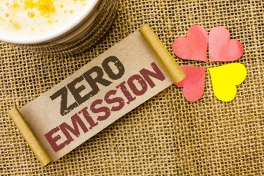 Writing note showing  Zero Emission. Business photo showcasing Engine Motor Energy Source that emits no waste products written on sticky Note on the jute background Love Hearts next to it. clipart