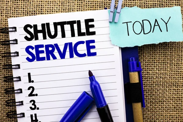 Word writing text Shuttle Service. Business concept for Transportation Offer Vacational Travel Tourism Vehicle written on Notebook Book on the jute background Today Pens next to it.