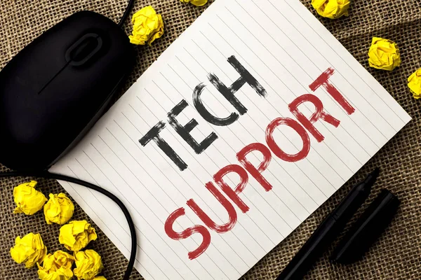 Word writing text Tech Support. Business concept for Help given by technician Online or Call Center Customer Service written on Notebook Paper on the jute background Marker and Mouse next to it.