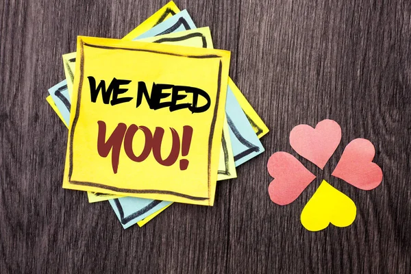 Text sign showing We Need You Motivational Call. Conceptual photo Company wants to recruit Employee required written on Stacked Sticky Note Papers on the wooden background Hearts next to it. — Stock Photo, Image