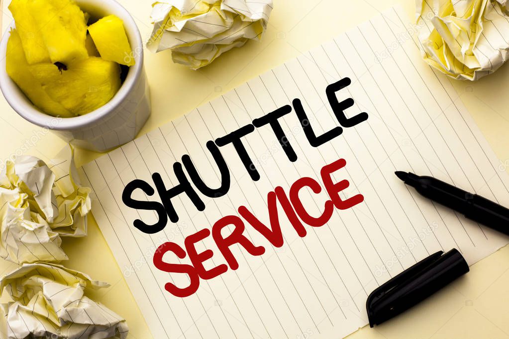 Conceptual hand writing showing Shuttle Service. Business photo showcasing Transportation Offer Vacational Travel Tourism Vehicle written on Notebook Paper on the plain background Cup Marker