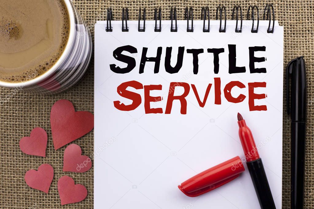 Conceptual hand writing showing Shuttle Service. Business photo showcasing Transportation Offer Vacational Travel Tourism Vehicle written on Notebook Book on the jute background Cup Hearts Pen