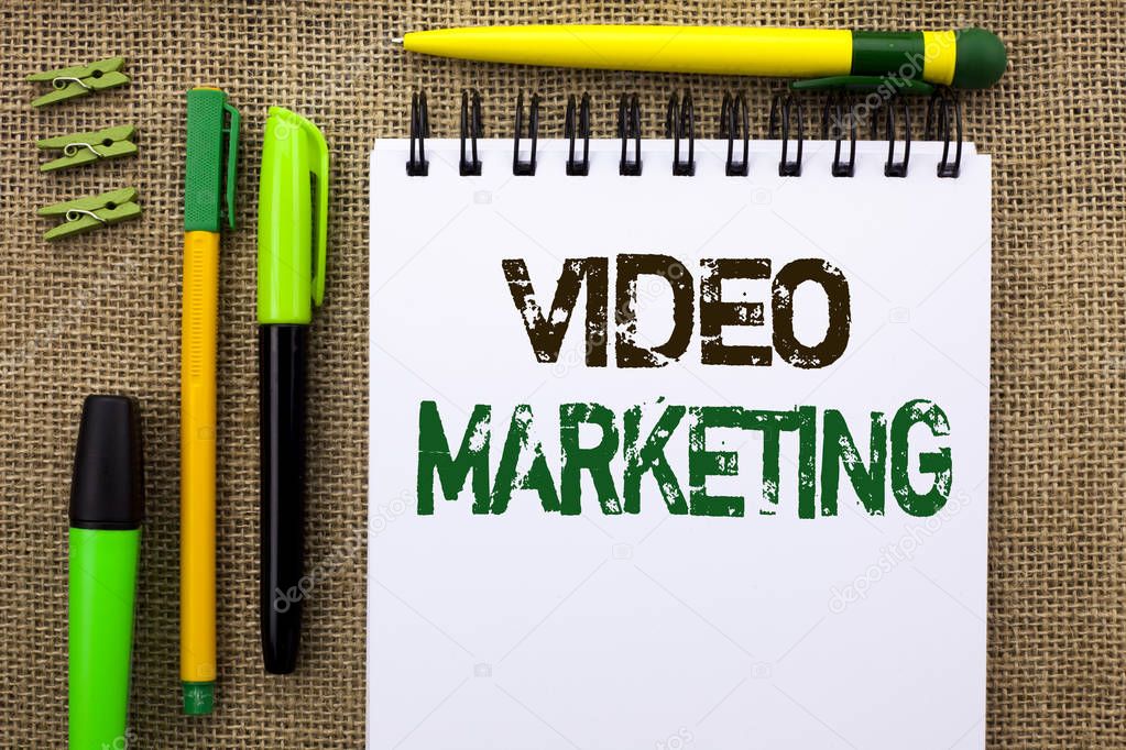 Word writing text Video Marketing. Business concept for Media Advertising Multimedia Promotion Digital Strategy written on Notebook Book on the jute background Pens and Clips next to it.