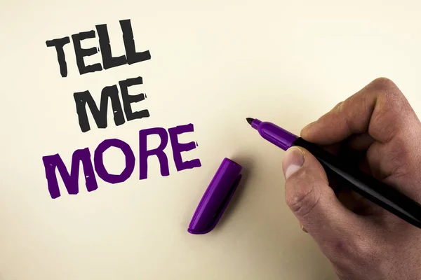 Conceptual hand writing showing Tell Me More. Business photo showcasing Elaborate your business thoughts further for assistance written by Man on plain background holding Marker in Hand. — Stock Photo, Image