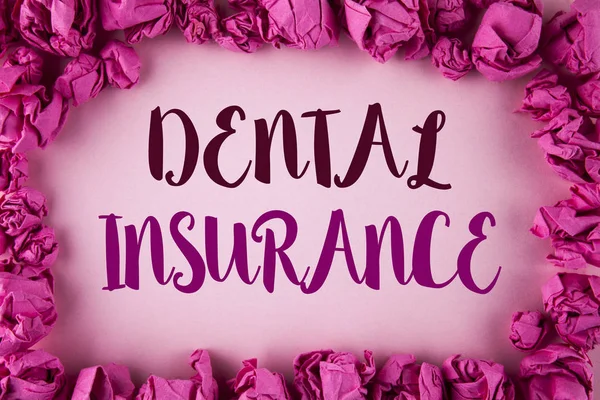 Writing note showing  Dental Insurance. Business photo showcasing Dentist healthcare provision coverage plans claims benefit written on plain background within Pink Paper Balls