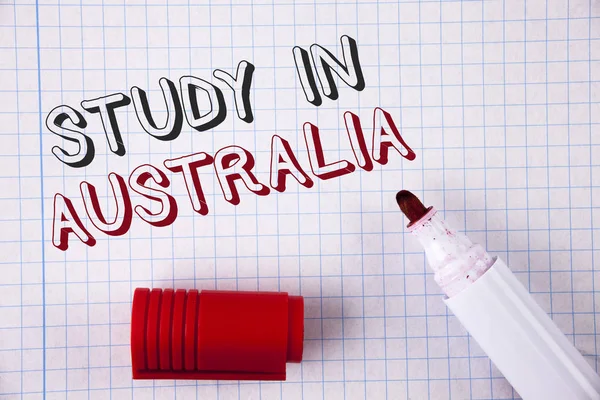 Text sign showing Study In Australia. Conceptual photo Graduate from oversea universities great opportunity written on Notebook paper Opened marker next to it. Top view. — Stock Photo, Image