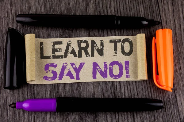 Conceptual hand writing showing Learn To Say No Motivational Call. Business photo text Encouragement advice tips morality values written on Cardboard Paper on the wooden background Markers next to it. — Stock Photo, Image