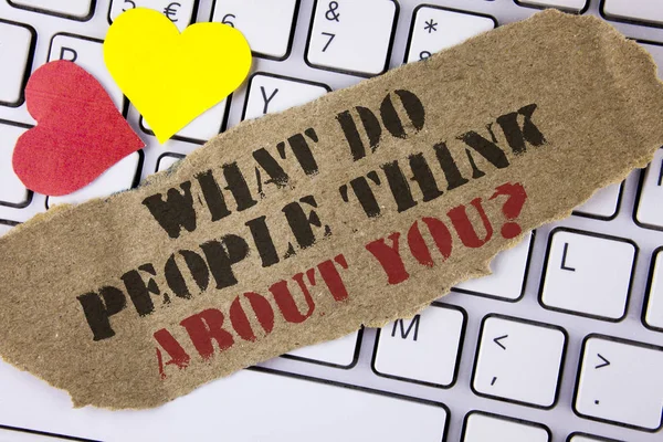 Conceptual hand writing showing What Do People Think About You Question. Business photo text This is how others judge you written on Tear Cardboard Piece placed on the Laptop Hearts. — Stock Photo, Image