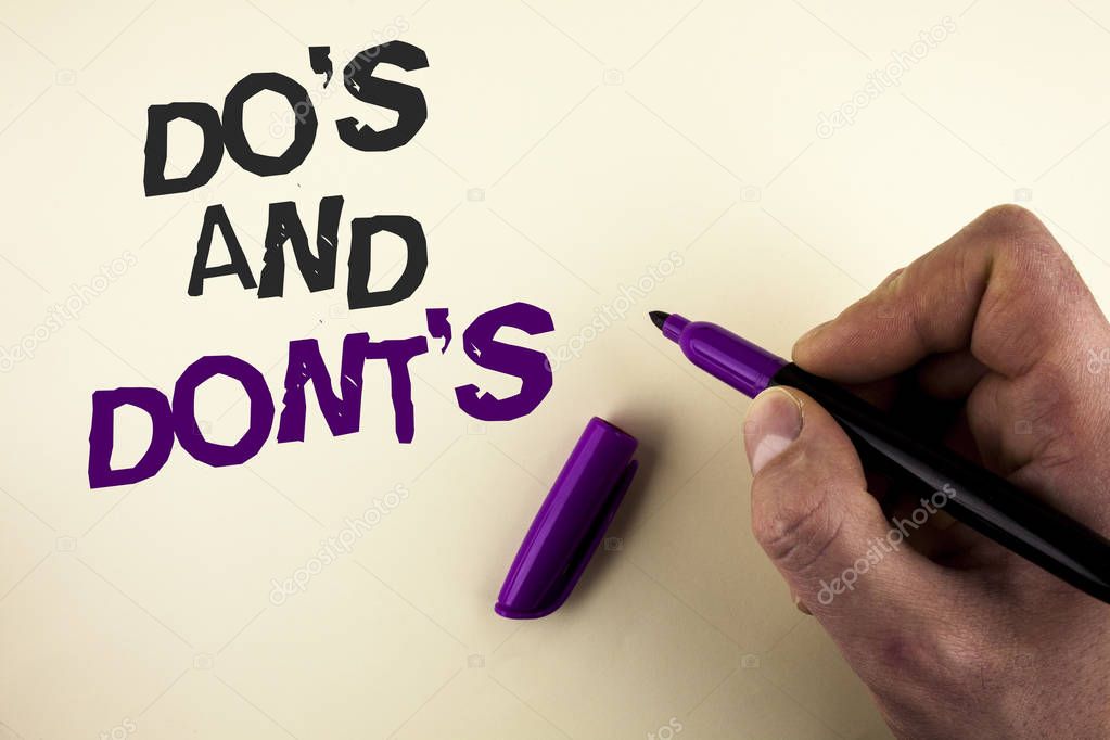 Conceptual hand writing showing Do'S And Don'Ts. Business photo showcasing What can be done and what cannot be knowing right wrong written by Man on plain background holding Marker in Hand.