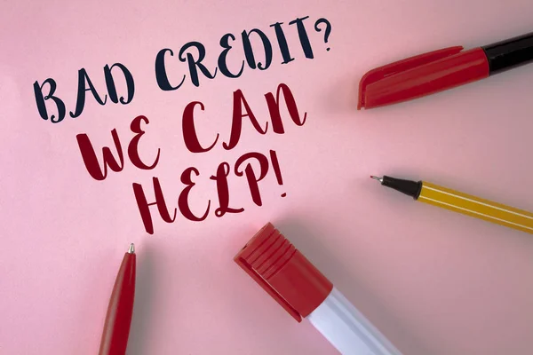 Text sign showing Bad Credit Question We Can Help Motivational Call. Conceptual photo achieve good debt health written on plain Pink background Pens and Marker next to it.