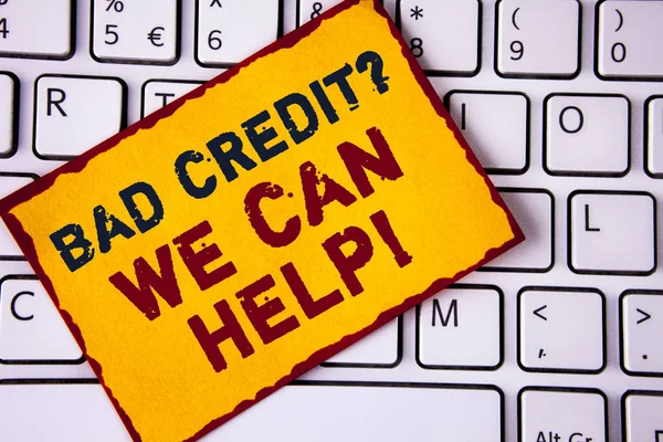 Handwriting text writing Bad Credit Question We Can Help Motivational Call. Concept meaning achieve good debt health written on Sticky note paper placed on White Keyboard. Top view.