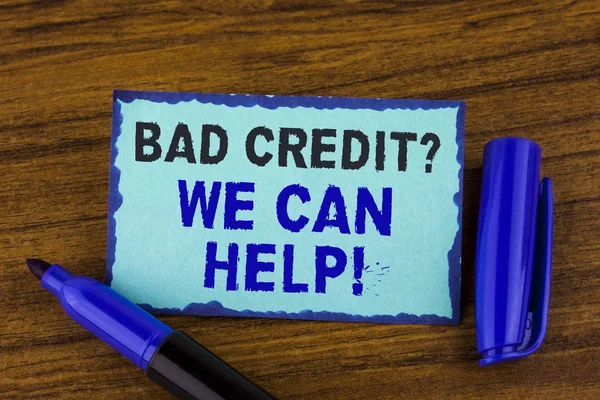 Text sign showing Bad Credit Question We Can Help Motivational Call. Conceptual photo achieve good debt health written on Sticky Note paper on the wooden background Marker next to it.