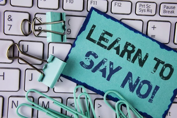 Handwriting text Learn To Say No Motivational Call. Concept meaning Encouragement advice tips morality values written on Sticky Note paper placed on White Keyboard Clips and Paper Pins next to it. — Stock Photo, Image