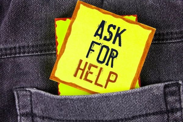 Text sign showing Ask For Help. Conceptual photo Use powers completely taking support from people around you written on Yellow Sticky Note Paper placed on the Jeans background.