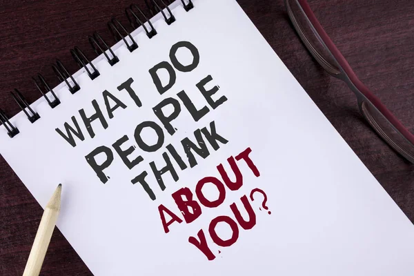 Text sign showing What Do People Think About You Question. Conceptual photo This is how others judge you written on Notepad on the Wooden background Pencil and Glasses next to it. — Stock Photo, Image