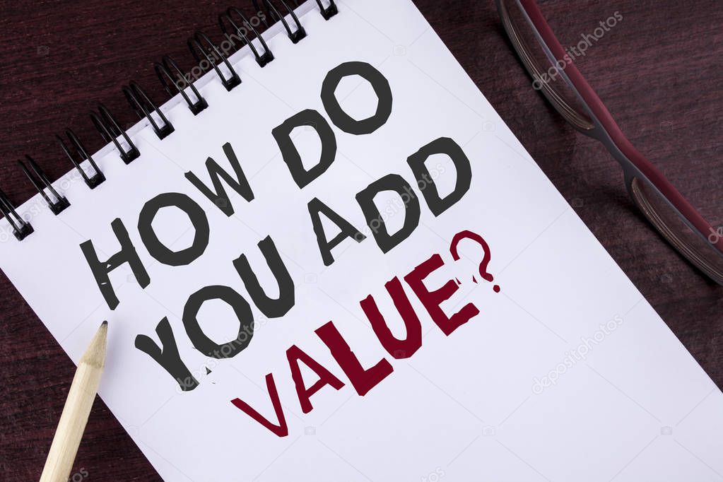 Text sign showing How Do You Add Value Question. Conceptual photo Bring business progress contribute earn written on Notepad on the Wooden background Pencil and Glasses next to it.