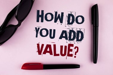 Text sign showing How Do You Add Value Question. Conceptual photo Bring business progress contribute earn written on plain background Markers and Sun Glasses next to it. clipart