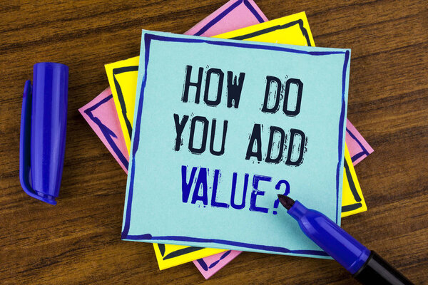 Handwriting text writing How Do You Add Value Question. Concept meaning Bring business progress contribute earn written on Sticky note paper on wooden background Marker next to it.