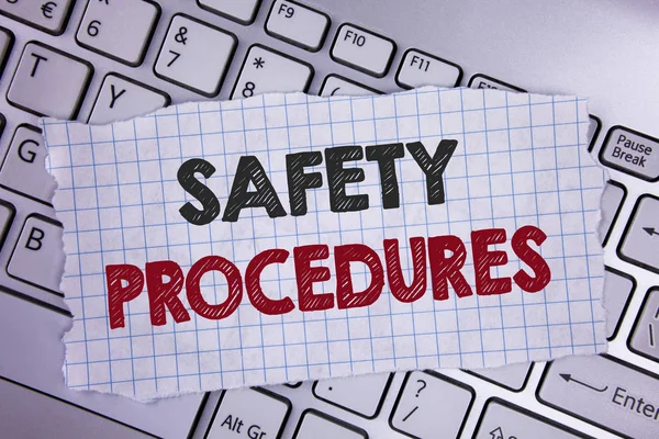 Text sign showing Safety Procedures. Conceptual photo Follow rules and regulations for workplace security written on Tear Notebook paper placed on the Laptop.