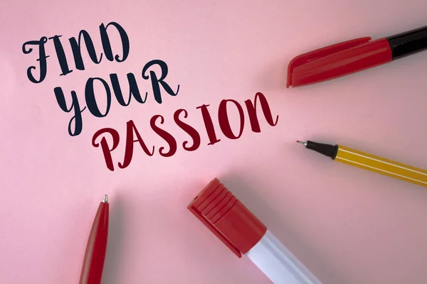 Text sign showing Find Your Passion. Conceptual photo No more unemployment find challenging dream career written on plain Pink background Pens and Marker next to it.