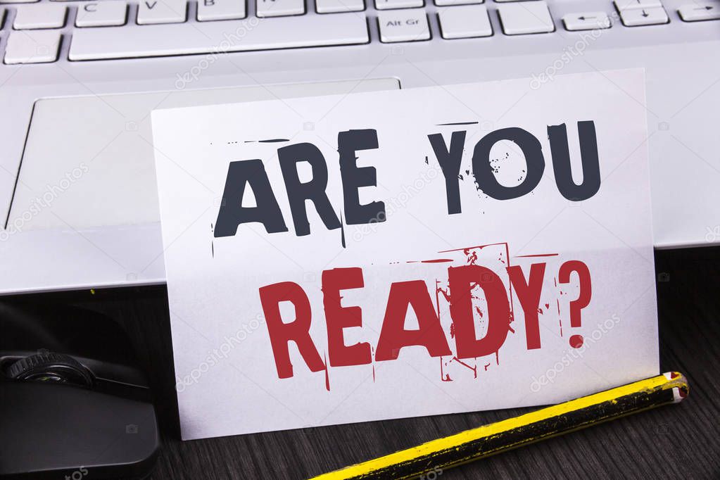 Text sign showing Are You Ready Question. Conceptual photo Prepare well to face upcoming business changes written on White Sticky Note Paper placed on wooden table Pencil Laoptop Mouse.