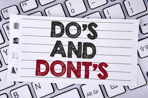 Text sign showing Do\'S And Don\'Ts. Conceptual photo What can be done and what cannot be knowing right wrong written on Notebook paper placed on the Laptop.