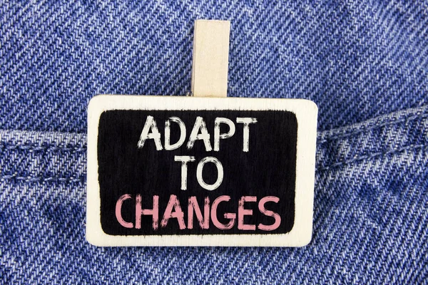 Conceptual hand writing showing Adapt To Changes. Business photo text Innovative changes adaption with technological evolution written on Wood Piece on the Jeans background. — Stock Photo, Image