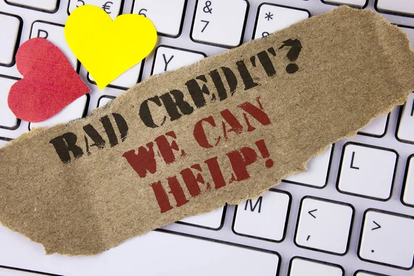 Conceptual hand writing showing Bad Credit Question We Can Help Motivational Call. Business photo text achieve good debt health written on Tear Cardboard Piece placed on the Laptop Hearts.