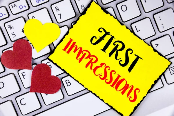 Writing note showing  First Impressions. Business photo showcasing Encounter presentation performance job interview courtship written on Yellow Sticky Note Paper placed on Laptop Hearts next to it. — Stock Photo, Image