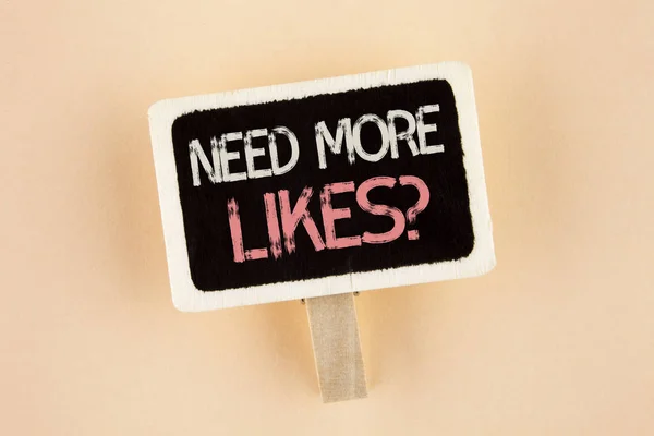 Handwriting text Need More Likes Question. Concept meaning Social media create more fans followers community written on Wooden Notice Board on the plain background. — Stock Photo, Image