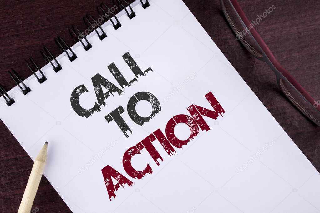 Text sign showing Call To Action. Conceptual photo most important part of online digital marketing campaign written on Notepad on the Wooden background Pencil and Glasses next to it.
