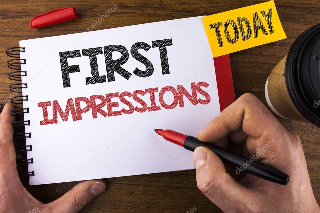 Conceptual hand writing showing First Impressions. Business photo text Encounter presentation performance job interview courtship written by Man on Notepad holding Pen Wooden background Today Cup