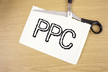 Kavramsal el yazma gösteren Ppc. iş fotoğraf metin ödeme başına tıklatın reklam stratejileri doğrudan trafik ahşap arka plan Çalışma platformları üzerinde gözyaşı defter kağıt üzerinde yazılı web sitelerine.