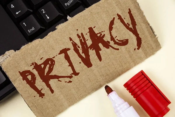 Text sign showing Privacy. Conceptual photo Right to keep personal matters and information as a secret written on Tear Cardboard Piece on plain background Keyboard and Marker next to it.