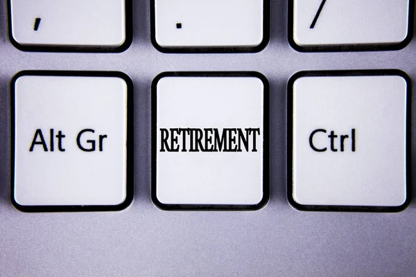 Text sign showing Retirement. Conceptual photo Leaving Job Stop Ceasing to Work after reaching some age written on White Keyboard Key with copy space. Top view. — Stock Photo, Image