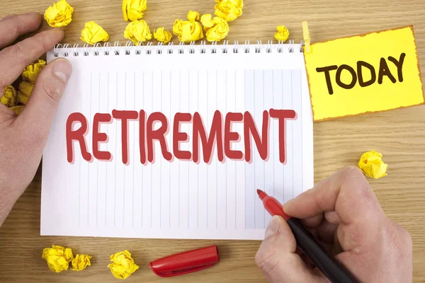 Text sign showing Retirement. Conceptual photo Leaving Job Stop Ceasing to Work after reaching some age written by Man on Notepad holding  Marker on wooden background Today Paper Balls, — Stock Photo, Image