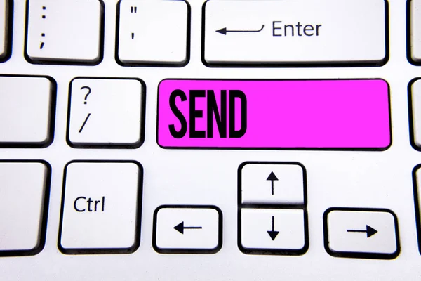 Conceptual hand writing showing Send. Business photo text Arrange something to be delivered Mail a thing Deliver a message written on Key Button on White Keyboard with copy space. Top view.