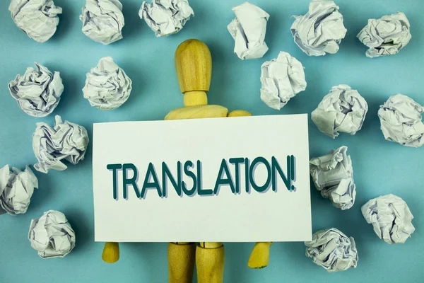 Writing Obs visar översättning motiverande samtal. Företag foto annonstexter Transform ord eller texter till ett annat språk på fästis papper på enkel bakgrund leksak papper bollar. — Stockfoto