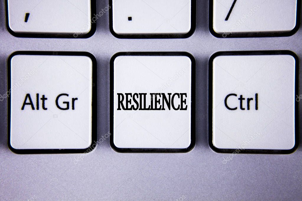 Text sign showing Resilience. Conceptual photo Capacity to recover quickly from difficulties Persistence written on White Keyboard Key with copy space. Top view.