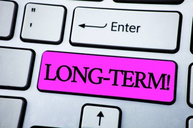 Uzun vadeli motivasyonel ara gösterilen metin işareti. Kavramsal fotoğraf büyük gelecek planları yazılı beyaz klavye pembe anahtarını düğmesinde kopya alanı ile süre içinde meydana gelen. Üstten Görünüm.