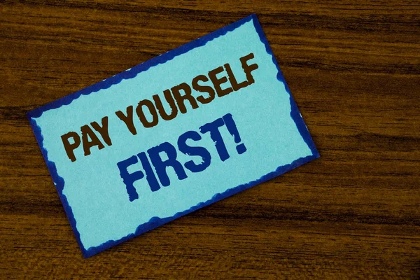 Text sign showing Pay Yourself First Motivational Call. Conceptual photo Personal Finance Save money for future written on Sticky note paper on the Wooden background. — Stock Photo, Image