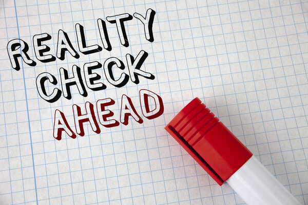 Handwriting text Reality Check Ahead. Concept meaning Unveil truth knowing actuality avoid being sceptical written on Notebook Paper Marker next to it. Top view.