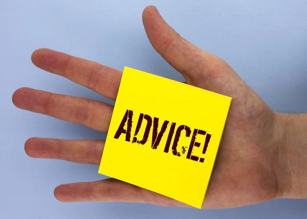Text sign showing Advice Motivational Call. Conceptual photo Learn to be good at advicing people, businesses written on Yellow Sticky Note Paper placed on Hand on the plain background. — Stock Photo, Image