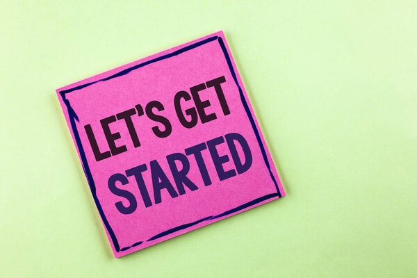 Text sign showing Lets Get Started. Conceptual photo beginning time motivational quote Inspiration encourage written on Pink Sticky Note Paper on the plain background.
