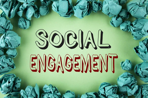 Word writing text Social Engagement. Business concept for post gets high reach Likes Ads SEO Advertising Marketing written on plain background within Paper Balls.